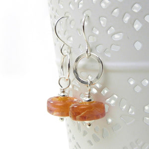 Orange lampwork glass bead and silver drop earrings