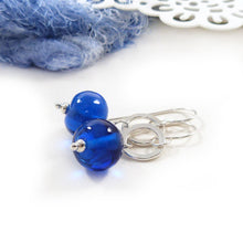 Bright blue glass bead and silver circle drop earrings