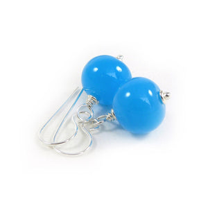 Bright blue glass bead and silver earrings