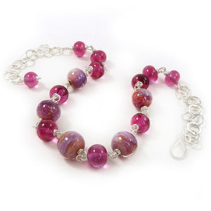 Pink lampwork bead and silver necklace