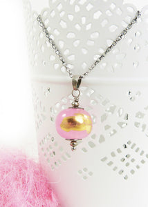 Pink lampwork glass with gold leaf bead pendant on an oxidised silver chain