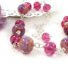 Pink lampwork bead and silver necklace