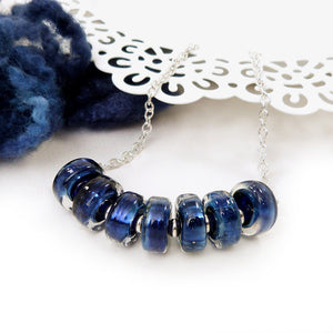 Blue glass bead and silver necklace