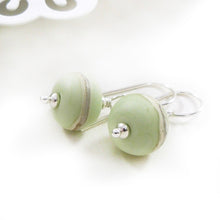 Pale green lampwork glass bead and silver drop earrings