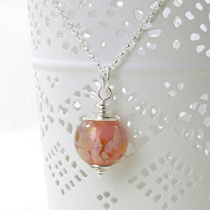 Peach lampwork glass bead pendant and silver chain