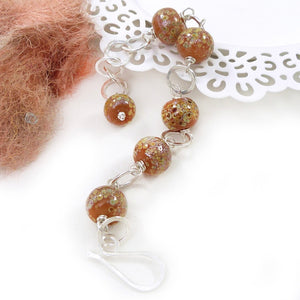 Orange speckled lampwork glass bead and sterling silver chain bracelet with big hook clasp