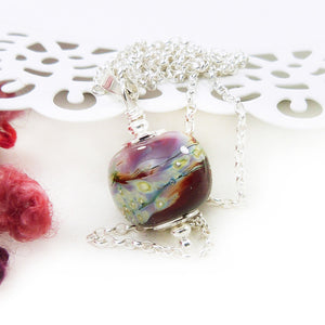 Red Swirled Lampwork glass bead pendant and siiver chain