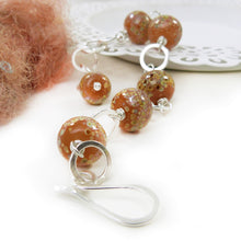 Orange speckled lampwork glass bead and sterling silver chain bracelet with big hook clasp