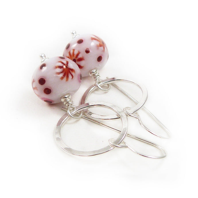 Red and White Bead earrings with silver ring on a white background