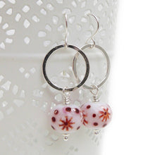 Red and White Bead earrings with silver ring on a white background