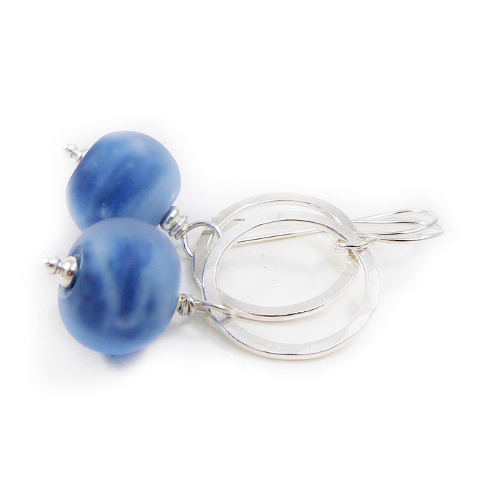 Blue glass bead earrings on a white background