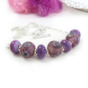 Purple lampwork glass bead and silver necklace
