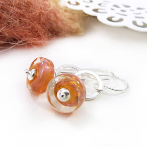 Orange lampwork glass bead and silver drop earrings