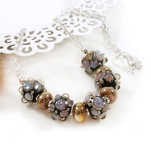Golden yellow lampwork glass and silver necklace