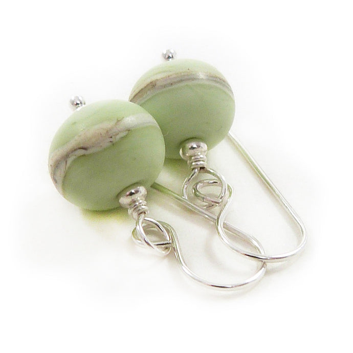 Pale green lampwork glass bead and silver drop earrings