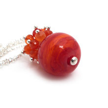 Orange Lampwork glass and carnelian gemstone pendant with sterling silver chain