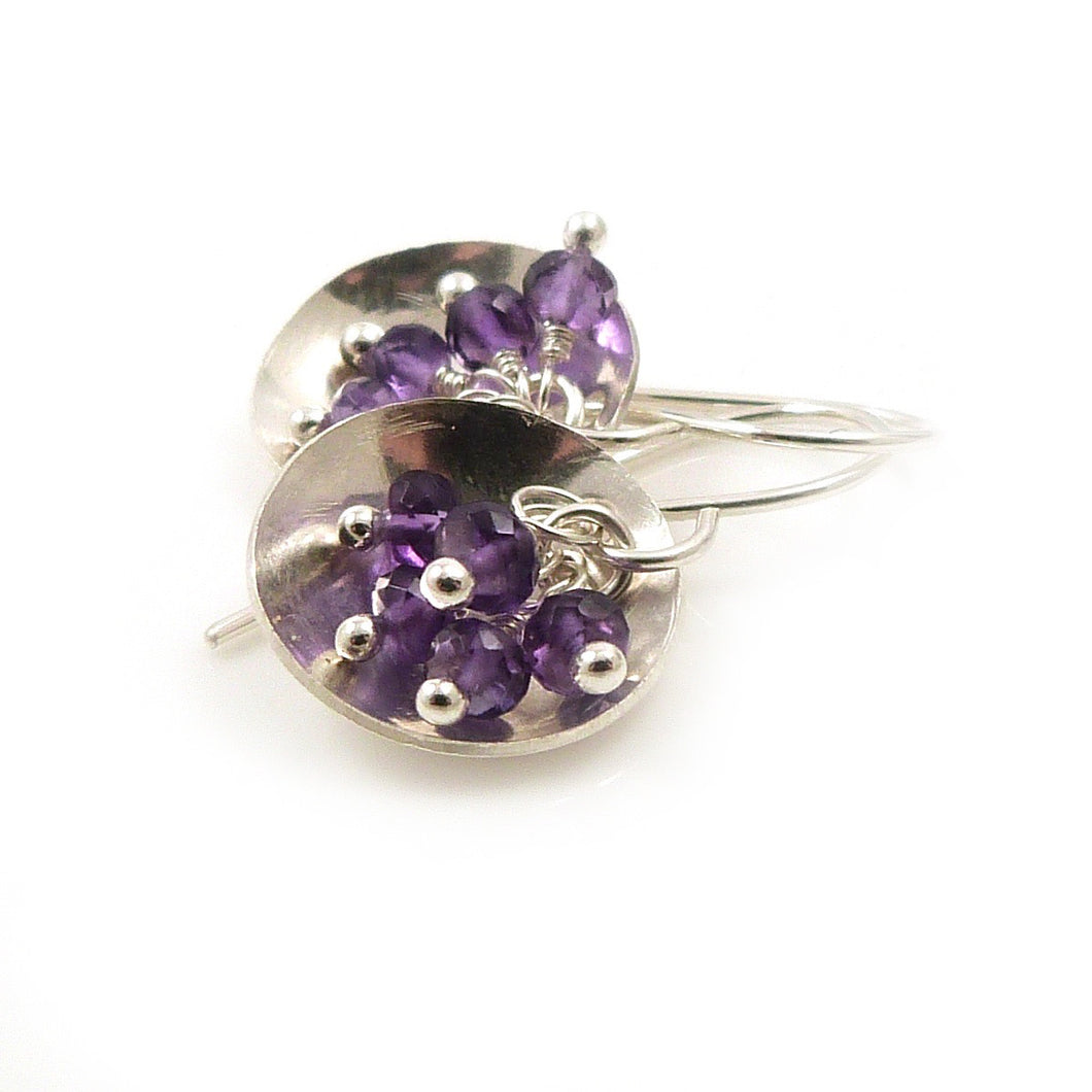 Drop earrings with clusters of Purple Amethyst Gemstones in a sterling silver dish 