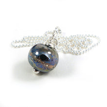 Bronze rainbow speckled metallic bead pendant with sterling silver chain