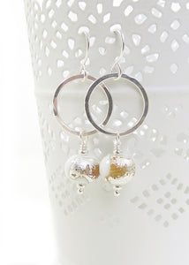 white lampwork glass bead and silver circle drop earrings