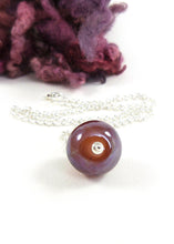 Raspberry Iridescent Lampwork Glass Bead Pendant and sterling silver chain
