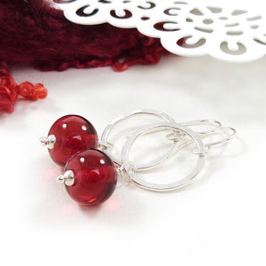 Red glass bead and silver circle drop earrings