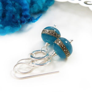 teal glass bead and silver circle drop earrings