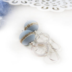 Pale blue glass bead and silver circle drop earrings