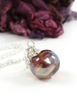 tawny brown metallic glass bead pendant with sterling silver chain
